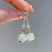 Boucles d'oreilles en or avec opale blanche antique
