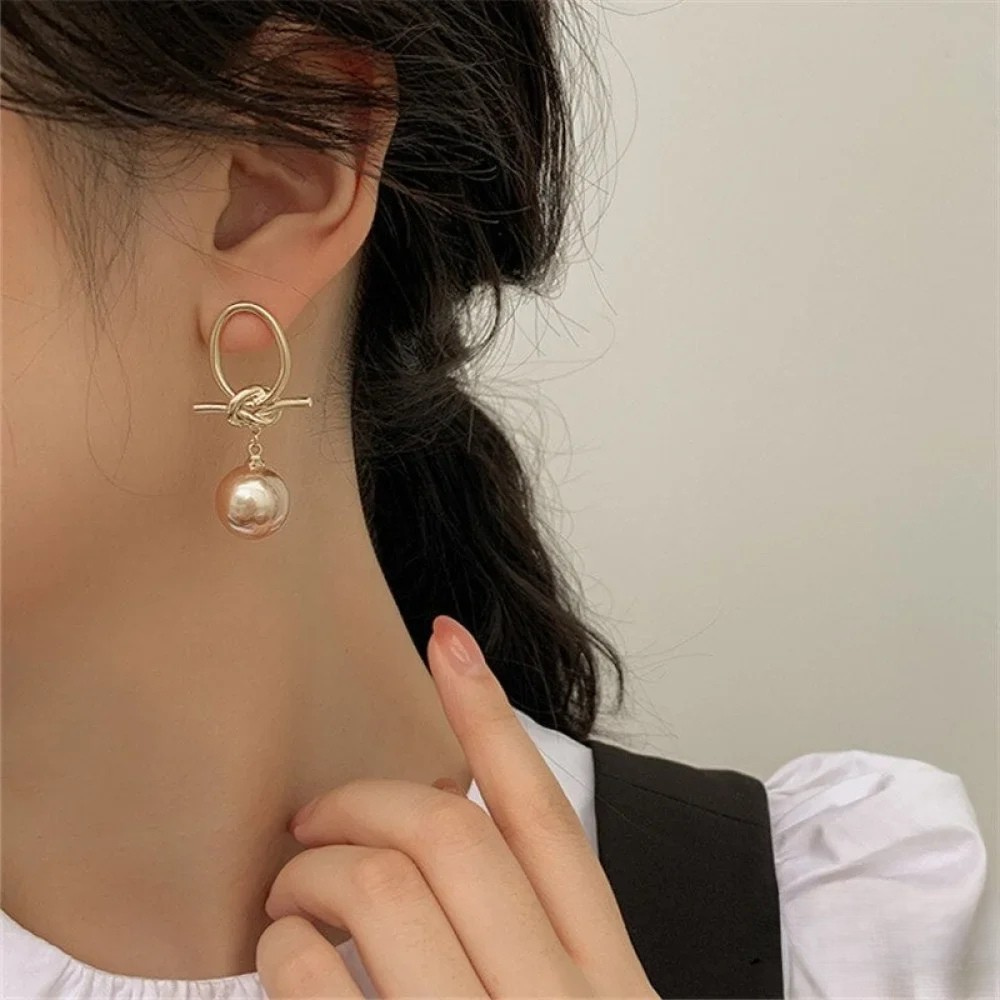 Boucles d'Oreilles en Perles Dorées